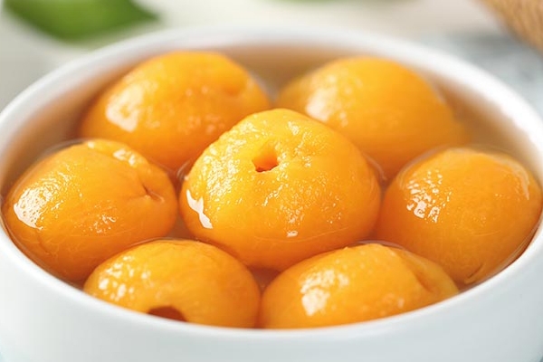 黄桃罐头是不是降火的,黄桃罐头上火吗?