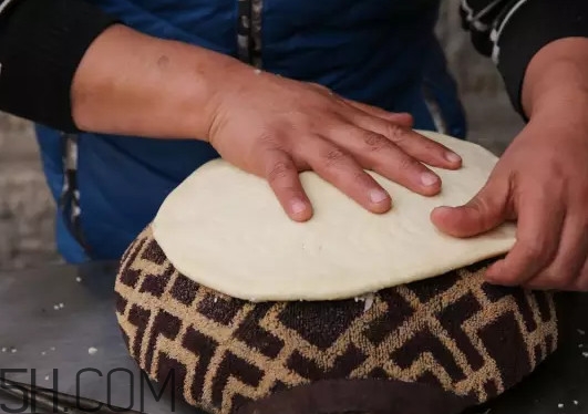 新疆的馕怎么做的,新疆馕饼的做法和配料