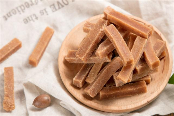 山楂条吃太多的副作用(山楂条吃多了有什么危害)