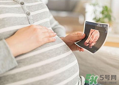 怀孕肚脐突出是男孩吗验证,怀孕肚脐突出是男孩吗?