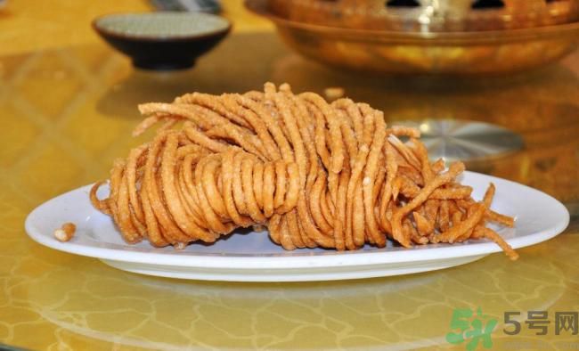 清明吃馓子寓意,吃痦子代表什么