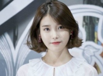 脸小可以剪刘海吗,小脸适合剪刘海吗