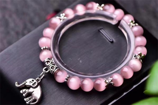 粉色猫眼石的真假对比照,猫眼石是天然的吗