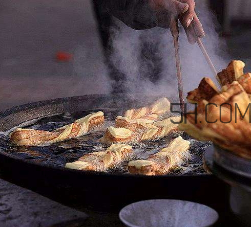 炸油条的方法(炸油条的方法及配方)